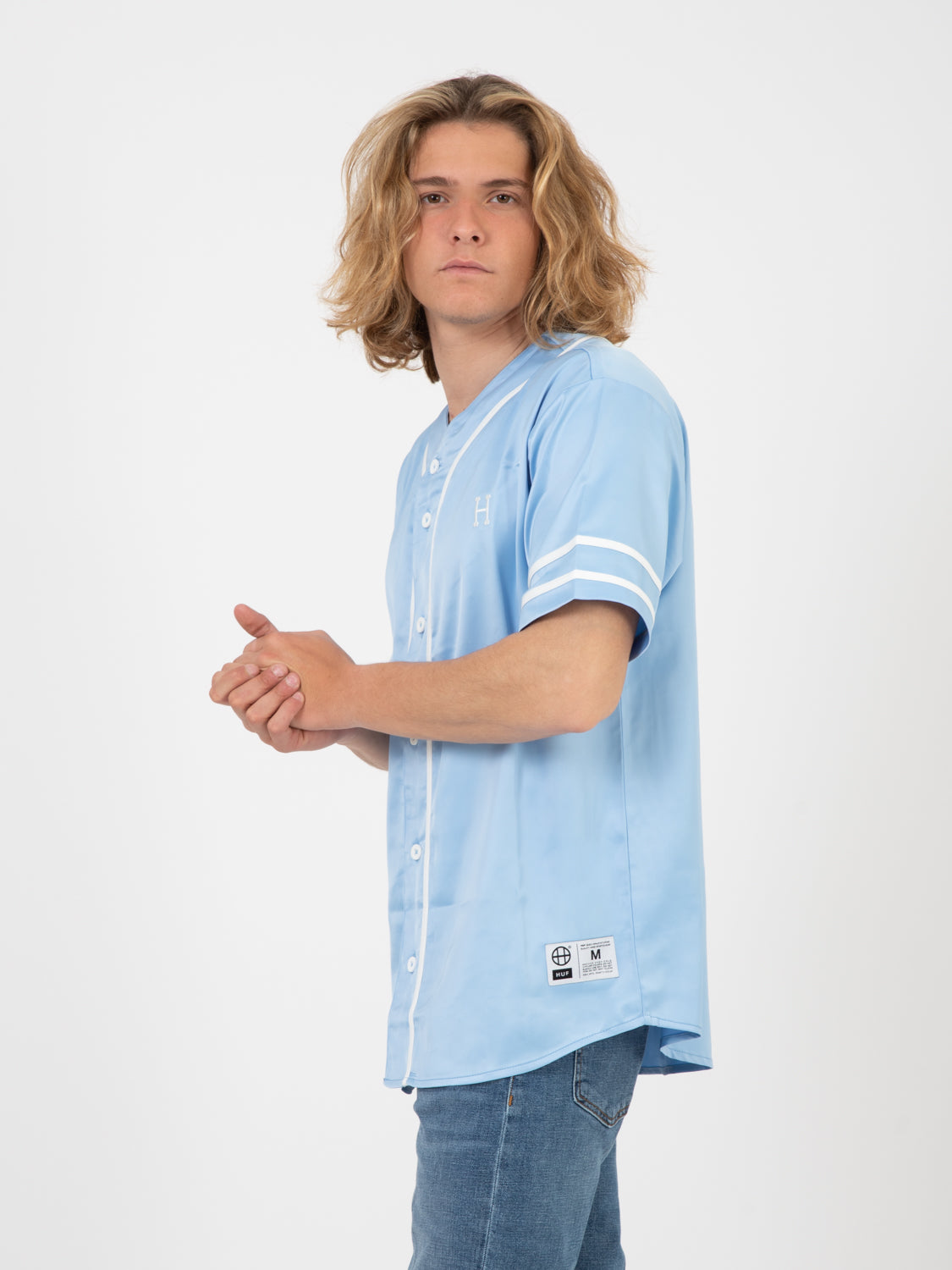 Community hand baseball jersey sky