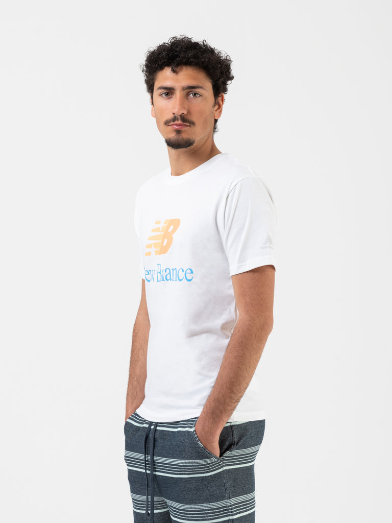 NEW BALANCE - T-shirt Essential Celebrate bianca