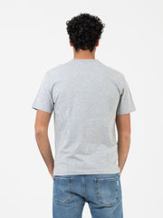 NEW BALANCE - T-shirt Hoops Essential grigia