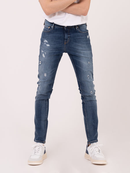 Jeans Skim super slim spinout con strappi