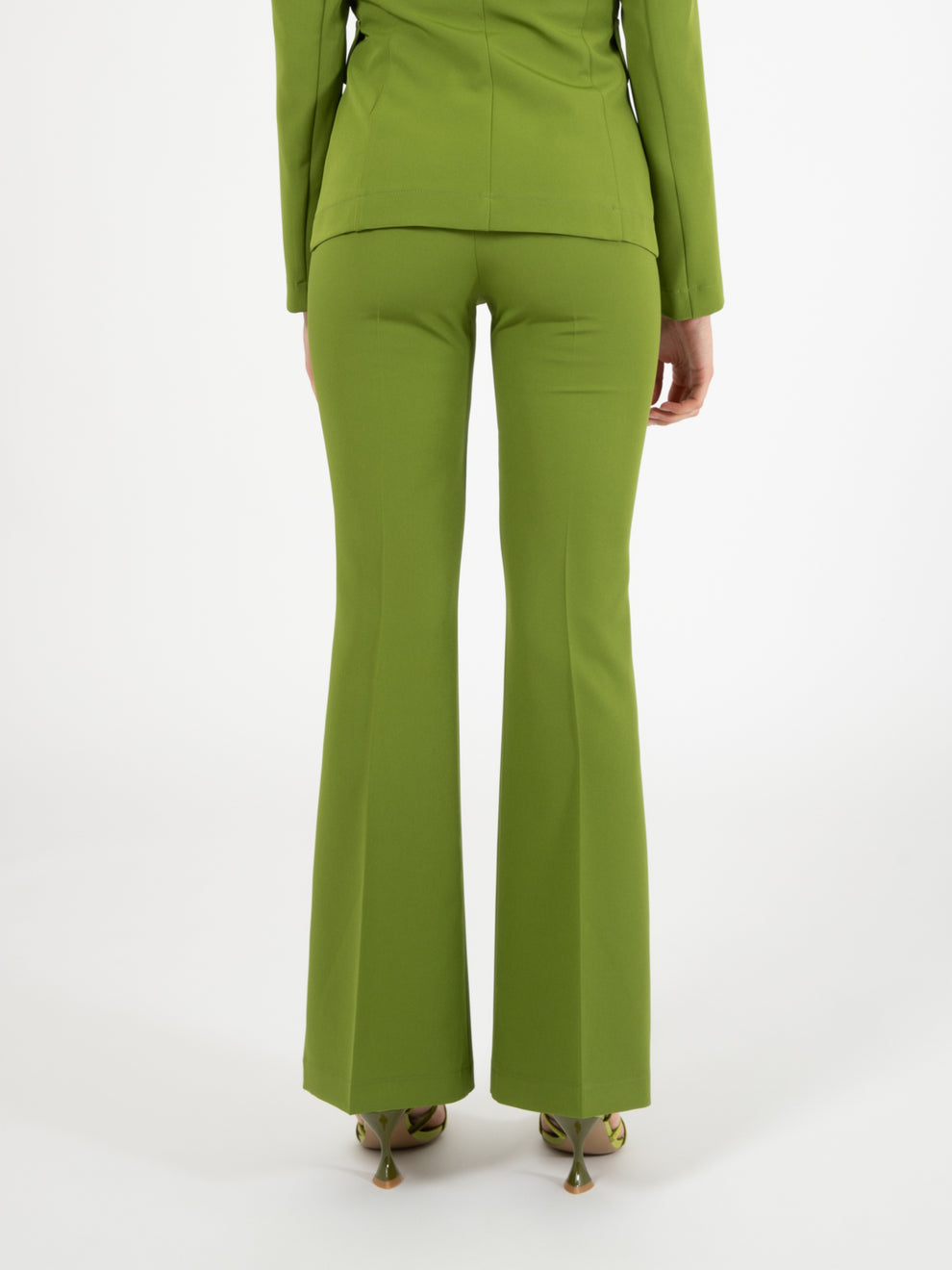 Green flared trousers