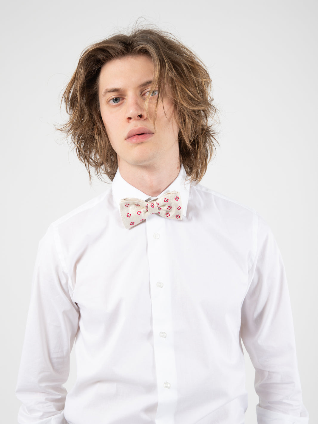 Cream/fuchsia flower bow tie