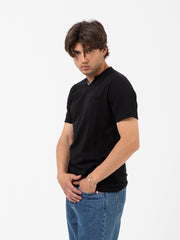 STIMM - T-shirt nera con bottoncini e taschino